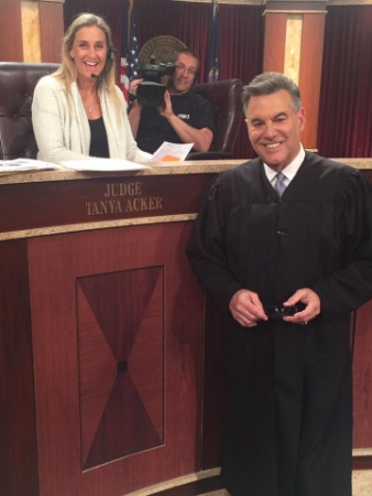 Larry Backman on Judge Unifrom with Judge Tanya at court.
